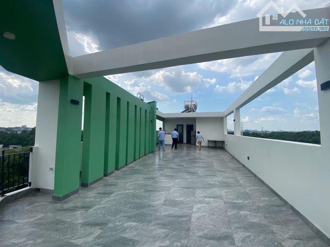 Bán nhà góc 2 mặt tiền thiết kế dạng căn hộ dịch vụ ngay cổng chào Bình Dương (8x23) - 2