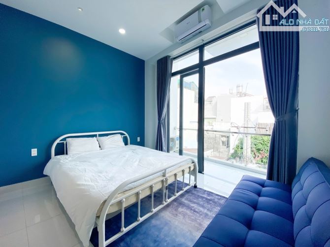 Mặt tiền khu Phan Xích Long, Phú Nhuận, 5 tầng, 9 phòng, dòng tiền 45tr/tháng - 2