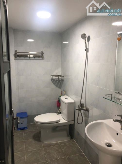 NHÀ 5 TẦNG 15 PHÒNG CHDV - DÒNG TIỀN 90TR/THÁNG - HXH - CÁCH MT 26M - DT 3,8X28 - 4