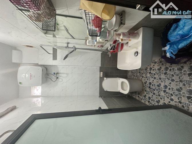 B.Á.N CCMN ĐỐNG ĐA. 42M2. MT: 5M. NỞ HẬU. 6 TẦNG. 10 PHÒNG. WC, CẦU THANG GIỮA. - 4