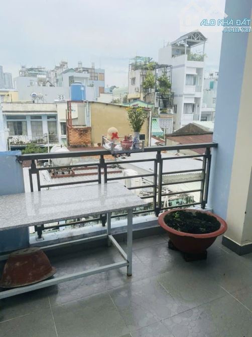 Mua 1 tặng 1. Nhà 3 tầng 6x12m, 6 phòng, 20tr/tháng Quận 4 - 4
