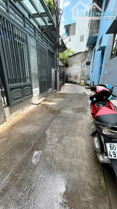 BÁN NHÀ NGUYỄN VĂN QUÁ, NGAY CHỢ CẦU, 6,4X11M, 2 TẦNG SÂN THƯỢNG - 7