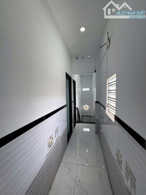 BÁN CĂN NHÀ 1 LẦU 1 TRỆT-4 PHÒNG NGỦ-GẦN CHỢ BÀ ĐIỂM-HÓC MÔN - 4