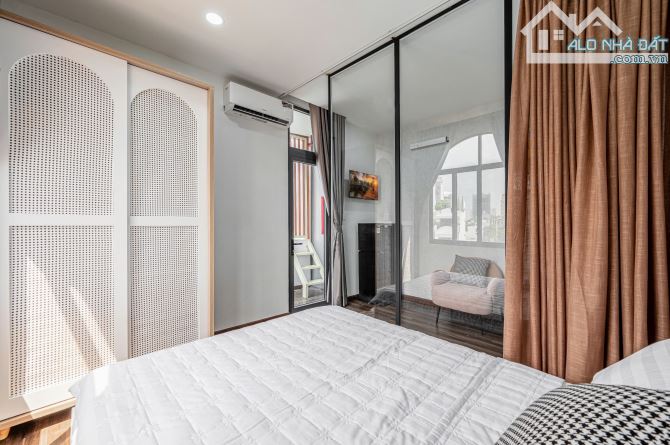 BÁN TÒA NHÀ 14 CHDV 6 TẦNG, TM (14.7 TỶ-100M2 ĐẤT) ĐƯỜNG HOÀNG HOA THÁM Q.BT. DT: 4.2X24M - 4