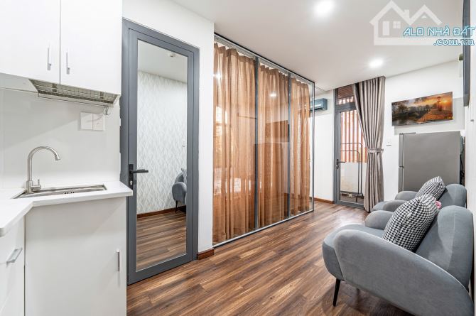 BÁN TÒA NHÀ 14 CHDV 6 TẦNG, TM (14.7 TỶ-100M2 ĐẤT) ĐƯỜNG HOÀNG HOA THÁM Q.BT. DT: 4.2X24M - 5