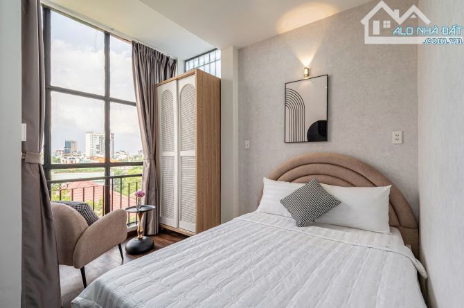 BÁN TÒA NHÀ 14 CHDV 6 TẦNG, TM (14.7 TỶ-100M2 ĐẤT) ĐƯỜNG HOÀNG HOA THÁM Q.BT. DT: 4.2X24M - 6
