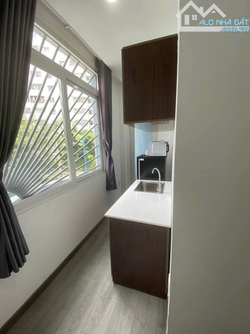 Ngộp Bank : CHDV 2 Mặt tiền ngay PHAN XÍCH LONG, DT: 11x18m, 4 Tầng, HĐT : 4.300$/Th - 1