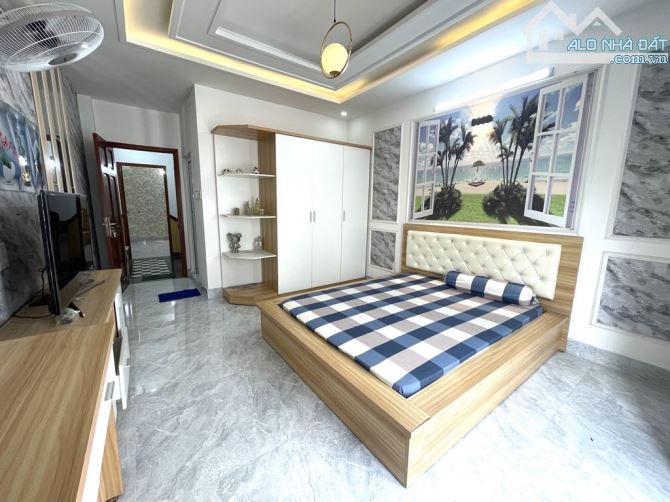 Nhà 5 tầng đúc BTCT 70m2 hẻm xe hơi nở hậu 6m2 đường Nguyễn Duy Cung Phường 12 Quận Gò Vấp - 12