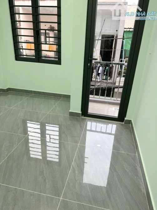Nhà mới 2lầu/ST cách MT vài căn Tùng Thiện Vương P12Q8 - 2