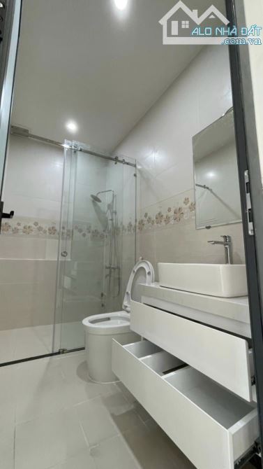 BÁN NHÀ 1 TRỆT 3 LẦU MỚI ĐẸP MẶT TIỀN HỒ TRI TÂN - 2