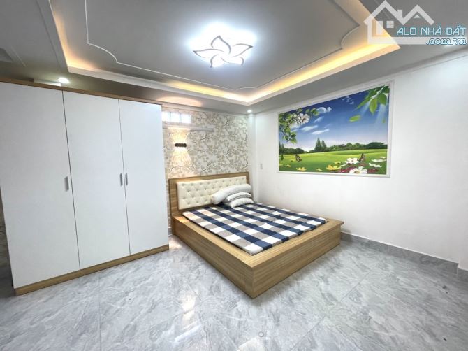 Nhà 5 tầng đúc BTCT 70m2 hẻm xe hơi nở hậu 6m2 đường Nguyễn Duy Cung Phường 12 Quận Gò Vấp - 7