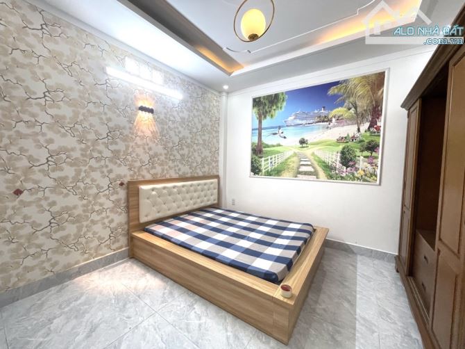Nhà 5 tầng đúc BTCT 70m2 hẻm xe hơi nở hậu 6m2 đường Nguyễn Duy Cung Phường 12 Quận Gò Vấp - 9
