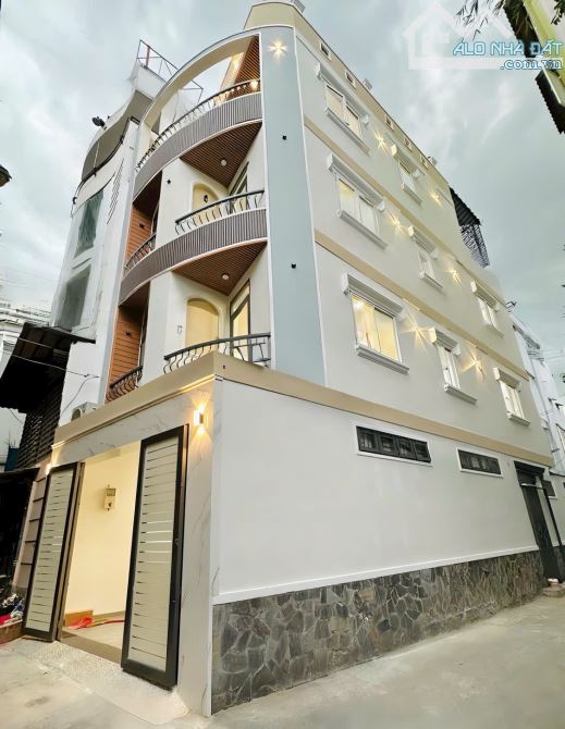 Nhà đẹp Phú Nhuận-Hẻm ô tô-Giáp Q1,Q3-Sát MT Nguyễn Đình Chính-P11-60m2-4,3x14-4tầng-4PN