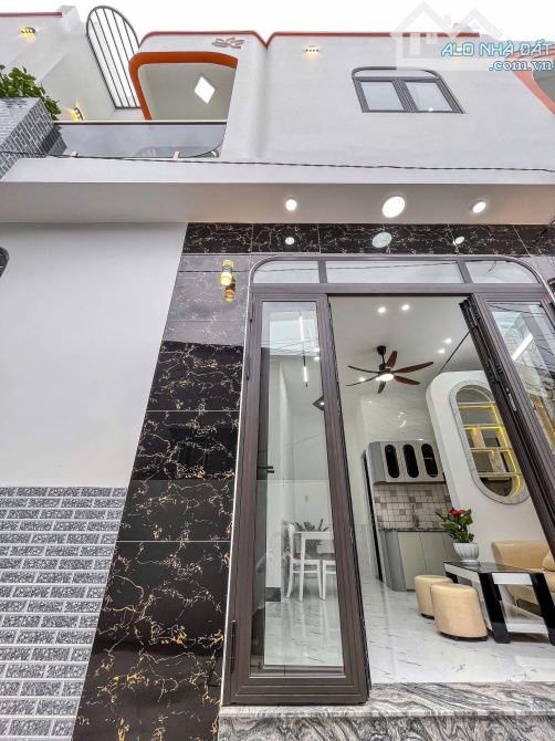 BÁN NHÀ TRỆT LẦU MỚI 100% ĐANG HOÀN THIỆN CÁCH CHỢ AN BÌNH 100M- ĐƯỜNG HOÀNG QUỐC VIỆT - T - 1