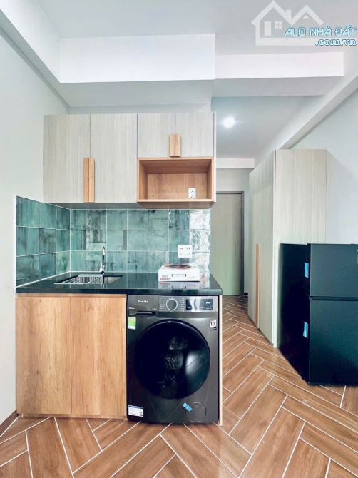 Tòa nhà căn hộ dịch vụ dòng tiền 200 triệu/tháng,12m x 25m, hẻm xe hơi,39 phòng cao cấp - 1
