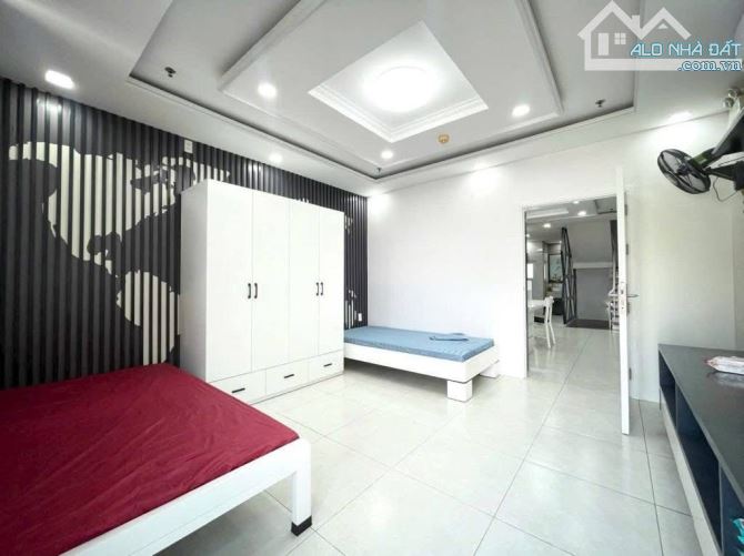 Bán nhà HXH 6M - 81m2- 4 tầng- Dân Trí Phường An Phú Đông gần trường ĐH Nguyễn Tất Thành. - 4