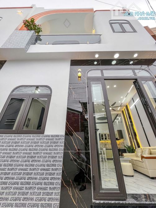 BÁN NHÀ TRỆT LẦU MỚI 100% ĐANG HOÀN THIỆN CÁCH CHỢ AN BÌNH 100M- ĐƯỜNG HOÀNG QUỐC VIỆT - T - 4