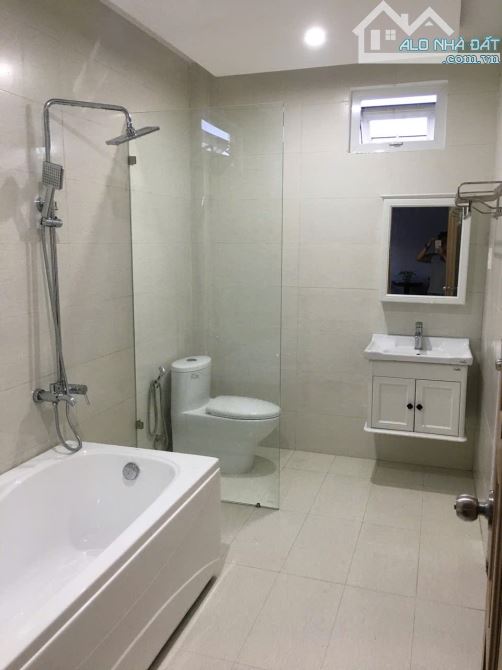 Bán tòa căn hộ 4 tầng, 7 phòng, dòng tiền 30tr Thanh Lương 9, Cẩm Lệ. DT 100m2. Giá 8.2 tỷ - 7