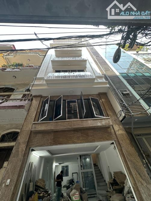 BÁN NHÀ LÔ GÓC 3 THOÁNG 21 tỷ 55m 6 TẦNG MT 5m THANG MÁY Ô TÔ ĐỖ HOÀNG QUỐC VIỆT CẦU GIẤY