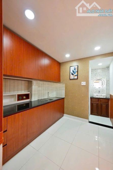 ĐI MỸ BÁN GẤP NHÀ PHAN XÍCH LONG 65M2 GIÁ 1.55 tỷ cho thuê 15tr. ở liền - 1