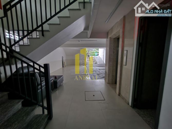 TÒA VĂN PHÒNG HẦM 4 LẦU GÓC 2 MẶT TIỀN - SÀN TRỐNG, CÓ THANG MÁY - 1