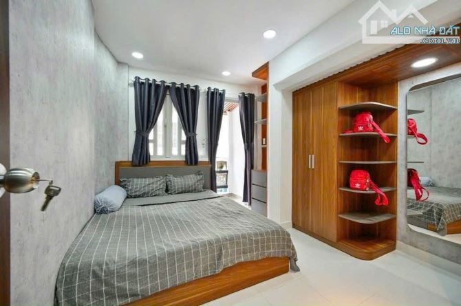 ĐI MỸ BÁN GẤP NHÀ PHAN XÍCH LONG 65M2 GIÁ 1.55 tỷ cho thuê 15tr. ở liền - 2