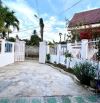 Bán căn nhà Vĩnh Hiệp 220m2 sau lưng hàng xe MG, gần D30, đường oto tận sân
