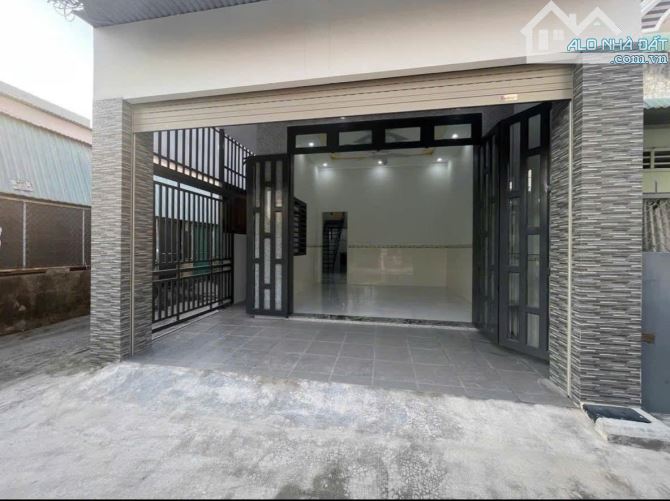 Bán căn nhà rất đẹp 90m2 đường nhựa ở Hóc môn giá 730 triệu.sổ hồng riêng