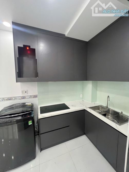 Quận 7 Phường Tân Hưng,ngang 4m nở hậu 6m,2 tầng sát hẻm xe hơi,nhỉnh 4 tỷ - 1