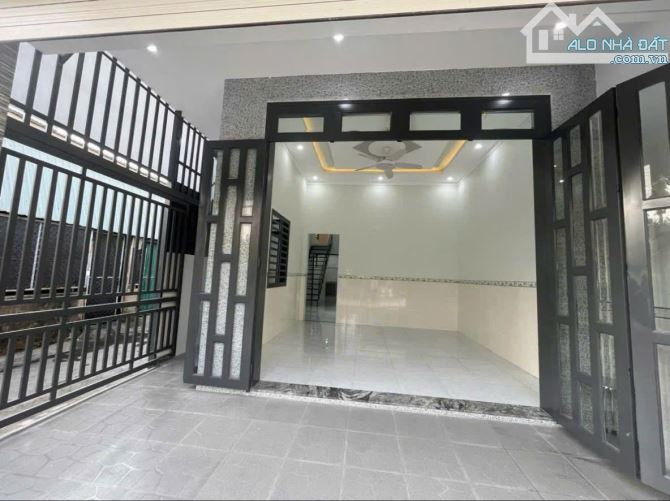 Bán căn nhà rất đẹp 90m2 đường nhựa ở Hóc môn giá 730 triệu.sổ hồng riêng - 1