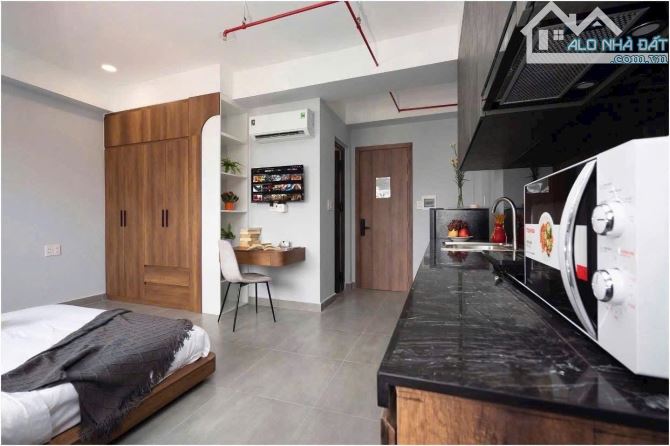 TOÀ NHÀ MẶT TIỀN ĐƯỜNG BÌNH QUỚI  ( 6 X 36M2 ) HẦM 7 TẦNG 20 CĂN HỘ THU NHẬP 120 TR - 2