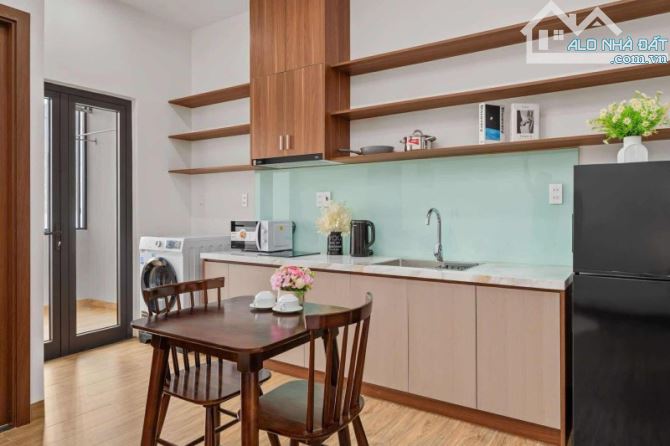 TOÀ CĂN HỘ 7 TẦNG ,11 PHÒNG -DÒNG TIỀN 80 TRIỆU THÁNG -NGAY CÔNG VIÊN HỒ NGHINH -BIỂN SƠÀ - 4