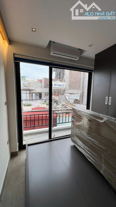 Nhà Lê Trọng Tấn – 38m² – 8 tầng thang máy – Ô tô sát nhà – Dòng tiền 30tr/th – 14,2 tỷ