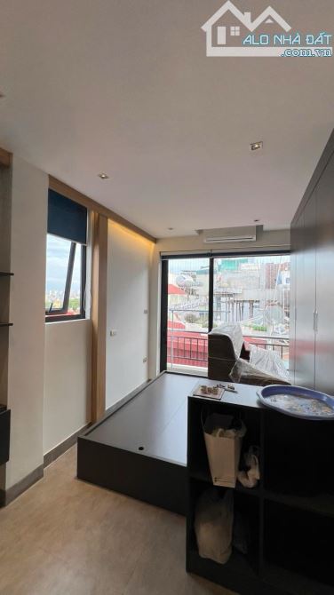 Nhà Lê Trọng Tấn – 38m² – 8 tầng thang máy – Ô tô sát nhà – Dòng tiền 30tr/th – 14,2 tỷ