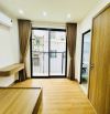 Cho thuê nhà nguyên căn 30m2x6T thang máy - Ôtô tránh, vỉa hè, view sân chơi phố Đội Cấn.