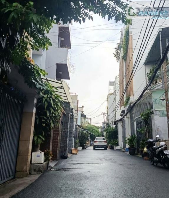 XE HƠI đậu cửa 54m²x4tầng nhà MỚI - ĐẸP thông ra Lê Quang Định 3