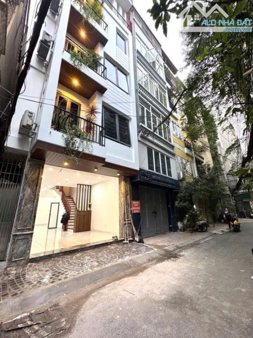 BÁN NHÀ PHÂN LÔ, VỈA HÈ, Ô TÔ TRÁNH PHỐ THÁI HÀ70 m2-mt 4.5m -6 tầng thang máy-30 tỷ 900