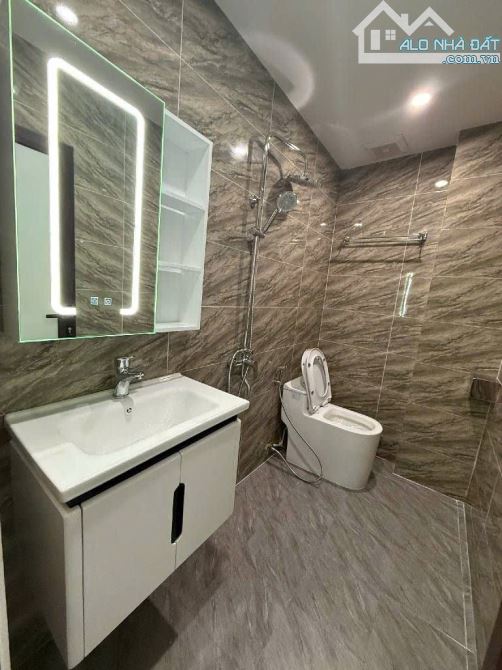 NHÀ ĐẸP - ĐỐNG ĐA - 7 TẦNG - THANG MÁY - GARA ÔTÔ - 50M² - MT 5M² - 25 TỶ