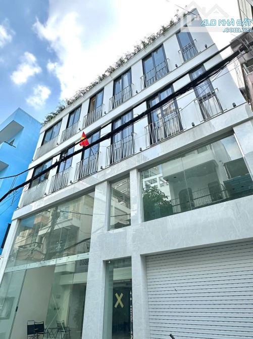 Gấp ! Bán Tòa Nhà Căn Hộ Dịch Vụ Trần Hưng Đạo Q1 8x25m NH13m CN240m2 Hầm 6 tầng 63 Tỷ