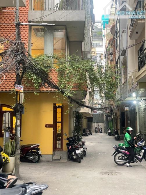 BÁN NHÀ TRẦN QUANG DIỆU - ĐỐNG ĐA - 6T THANG MÁY- LÔ GÓC - Ô TÔ VÀO NHÀ - KINH DOANH