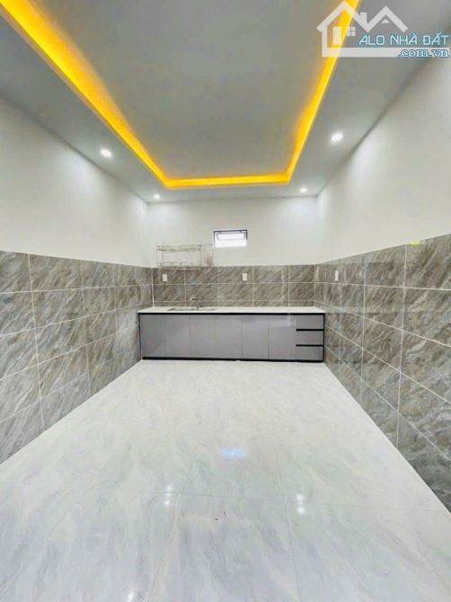 nhà c4 có gác lửng 104m2/1tỷ250 thuộc Phước Lâm-CG sổ hồng - 3