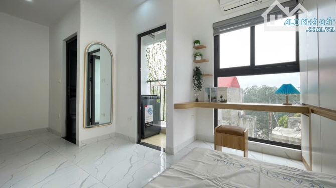 Tòa CHDV mặt đường lớn kinh doanh sầm uất, 3 xe tải tránh, vỉa hè, dòng tiền 1.5 tỷ/năm - 3