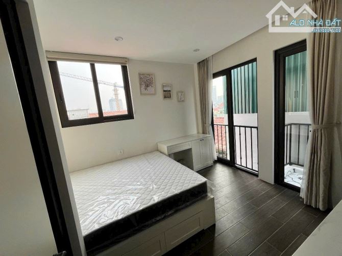 Toà CHDV Hoàng Hoa Thám, 85m2*8T, MT 5M, 18P KK, ngõ ô tô, đủ GPXD/PCCC, dòng tiền 8%/năm!