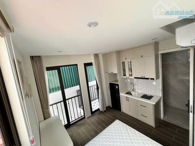 Toà CHDV Hoàng Hoa Thám, 85m2*8T, MT 5M, 18P KK, ngõ ô tô, đủ GPXD/PCCC, dòng tiền 8%/năm!