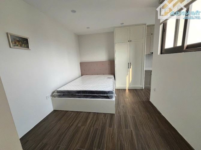 Toà CHDV Hoàng Hoa Thám, 85m2*8T, MT 5M, 18P KK, ngõ ô tô, đủ GPXD/PCCC, dòng tiền 8%/năm!