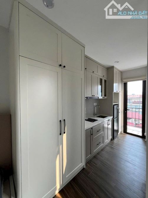 Toà CHDV Hoàng Hoa Thám, 85m2*8T, MT 5M, 18P KK, ngõ ô tô, đủ GPXD/PCCC, dòng tiền 8%/năm!