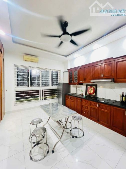 Bán gấp nhà mới 5 tầng lô góc thoáng, ngõ thông kinh doanh phố Phạm Văn Đồng 35M*2 5T giá - 3