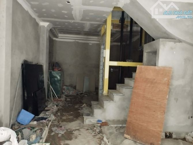 Bán gấp nhà đang xây 6 tầng thang máy-ô tô đỗ cổng phố Xuân Đỉnh 50M*2 6T giá hơn 13 tỷ - 1