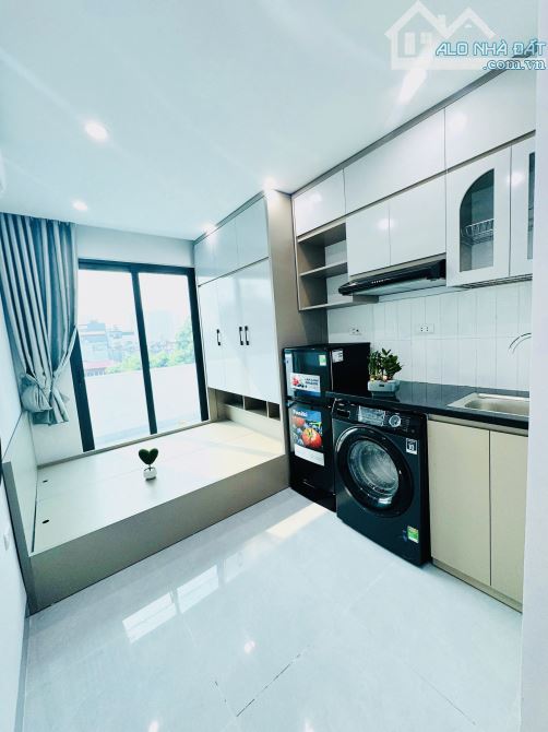 Bán toà CHDV Hoàng Cầu 2 thoáng trước sau sát phố gần HV Âm nhạc 60m2*6T 14PN, PCCC