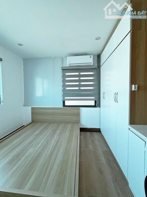 Toà CHDV Văn Cao, 115m2*7T, MT 6M, 21 phòng KK, ngõ 3 gác, đủ GPXD/PCCC, dòng tiền 7%/năm!